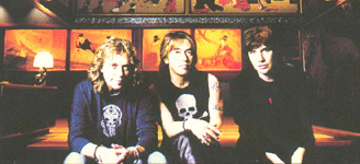 Jack Blades, Tak Matsumoto and Eric Martin